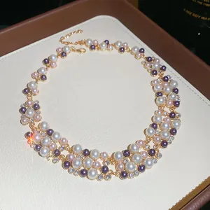 Detail view of elegant French vintage pearl necklace with sparkling rhinestones