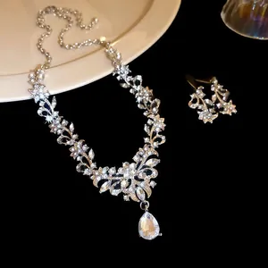 Elegant sparkling waterdrop crystal pendant necklace and earrings set floral design