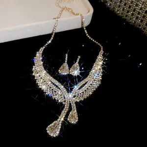 Macro view showing the sparkling details of the rhinestone water-drop necklace and earring set