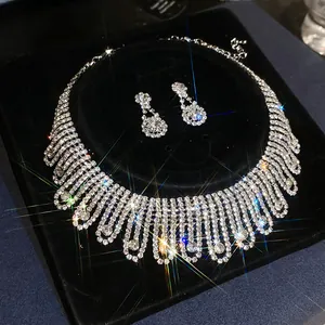 Elegant silver-toned rhinestone necklace and earrings jewelry set for bridal events
