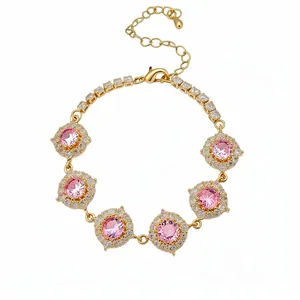 Bracciale in oro rosa con eleganti zirconi rosa tondi e accenti in cristallo