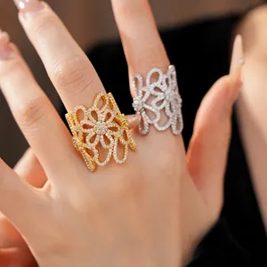 Exquisite 18K gold-plated hollow flower open rings with sparkling zircon inlay detail