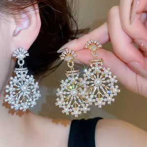 Elegant French vintage snowflake pearl drop earrings with sparkling cubic zirconia stones