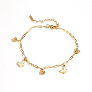 Detailed view of 18K gold plated butterfly anklet with steel beads and paperclip chain