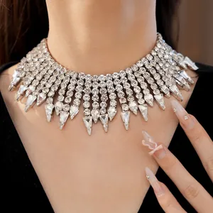 Detail of luxurious sparkling rhinestone fringe choker necklace on a model's neck