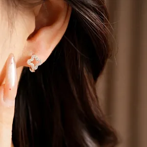 Elegant zircon hollow clover flower earrings for women minimalist style jewelry