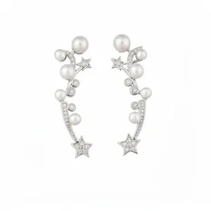 Elegant star ear clips with cubic zirconia and pearls for non-pierced ears.