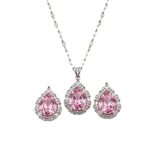 Elegant pear-shaped pink zircon jewelry set including a pendant necklace and drop earrings.