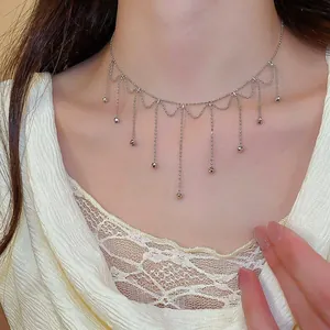 Elegant silver metal tassel choker necklace with delicate ball pendants for women