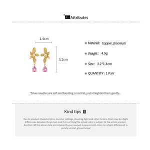 Detailed view of the flower earrings with measurements and material specifications