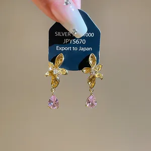 Elegant 18k gold plated flower earrings with pink zircon water drop dangles detail