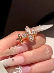 Exquisite gold-plated open ring with zircon star and flower design on hand