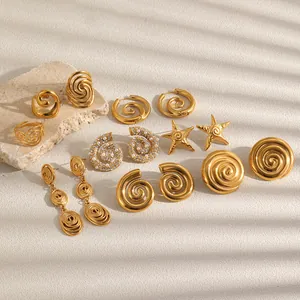 Detailed view of 18K gold plated stainless steel starfish and spiral jewelry collection