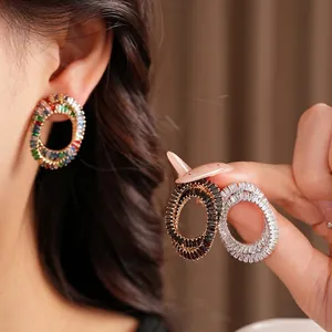 Silver needle oval earrings with zircon inlay in multiple colors and luxury style