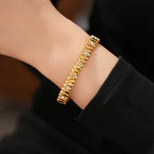 Detailed view of the gold-plated stainless steel bracelet with sparkling zircons