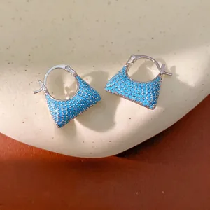 Elegant vintage zircon handbag-shaped hoop earrings with blue pave stones in silver