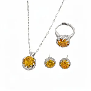 Elegant jewelry set with round yellow zircon stones including necklace, ring and earrings