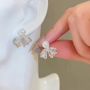Elegant 18K gold plated lace bow pearl stud earrings with sparkling zircon accents
