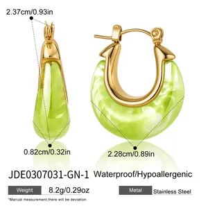 Detail showing green resin U-shaped earrings with measurements and material info.