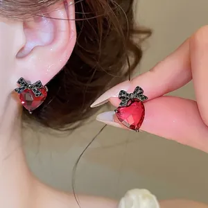 Elegant red heart stud earrings with black bowknot detail and S925 silver needle.