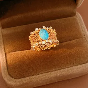 Vintage gold plated hollow lace ring with turquoise and zircon stones