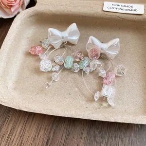 Boucles d'oreilles nœud avec pompons en cristal et perles de style princesse mignon