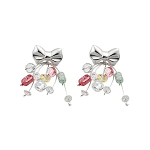 Boucles d'oreilles nœud en argent avec glands en cristal coloré style princesse