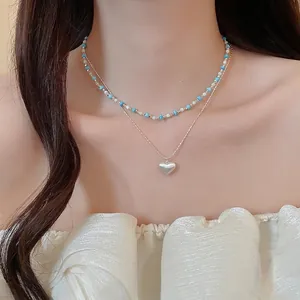 French vintage double-layered necklace with turquoise beads and heart pendant