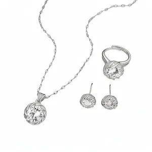 Parure de bijoux élégante en argent avec collier pendentif rond en zircon bague et boucles.