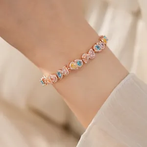 Elegant 18k gold plated bracelet featuring colorful teardrop cubic zirconia on wrist