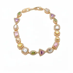18k gold plated bracelet with multi-colored geometric zircons on white background