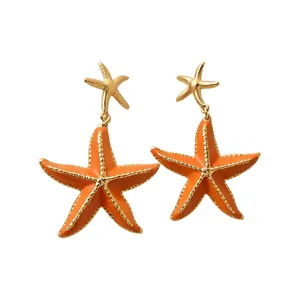 Elegant orange enamel starfish drop earrings with gold finish for summer island style