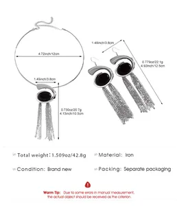 Silver iron snail spiral jewelry set with tassel earrings and choker spec details