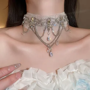 Close-up of a French vintage lace choker necklace with sparkling rhinestones and crystals