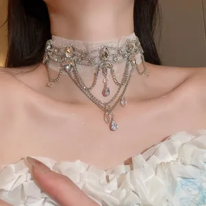Detailed macro shot of a French vintage lace choker with sparkling crystal flower accents