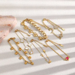 Set of six 18K gold plated stainless steel bracelets with heart and star charms