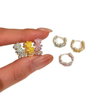 Elegant purple enamel flower hoop earrings for women in a sweet and versatile fashion style