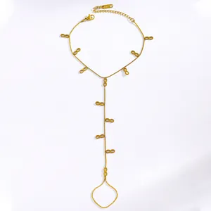 Gold stainless steel infinity hand chain bracelet with finger ring detail