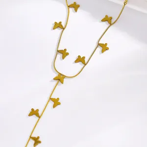 Close-up detail of a minimalist gold stainless steel butterfly hand back chain jewelry