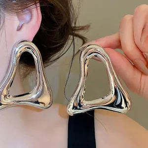 Statement oversized retro silver-tone hollow triangular metallic stud earrings for women
