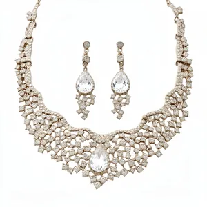 Elegant vintage palace style jewelry set with teardrop crystals and pave-set rhinestones