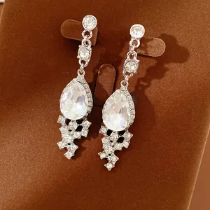Elegant silver-toned teardrop crystal earrings with sparkling rhinestone details