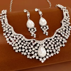 Detailed close-up view of silver crystal necklace set with pear-shaped teardrop stones