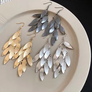 Vintage metallic leaf tassel drop earrings in gold, silver, and gunmetal finishes.