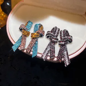 Orecchini a Bottone con Nodo di Strass Scintillanti Con Perno in Argento per Donna Design a Fiocco Minimalista Gioielli