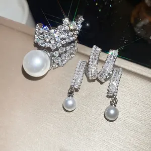 Elegant high-end luxury zircon and pearl jewelry set featuring a ring and earrings