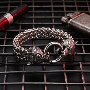 Detail view of the S925 engraved stamp on a double wolf head Viking stainless steel bracelet