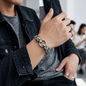 Detail of Viking wolf head double layer bracelet and matching vintage silver ring