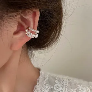 Κομψό σκουλαρίκι ear cuff με πέρλες για αυτιά χωρίς τρύπες σε γαλλικό στυλ.