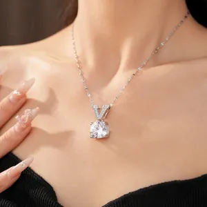 Silver-toned clavicle chain with a letter V and sparkling round zircon pendant necklace